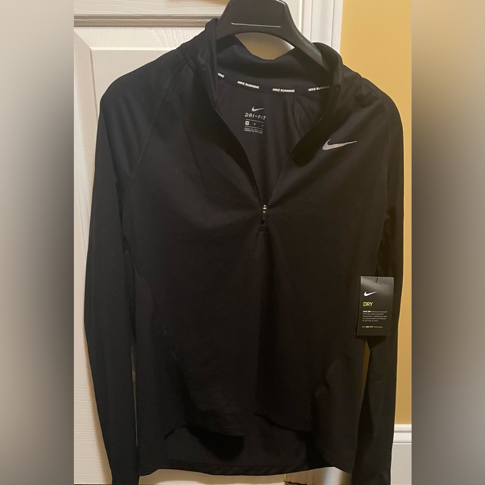 Black women’s Nike Dry-fit lightweight athletic pullover. tags still on.